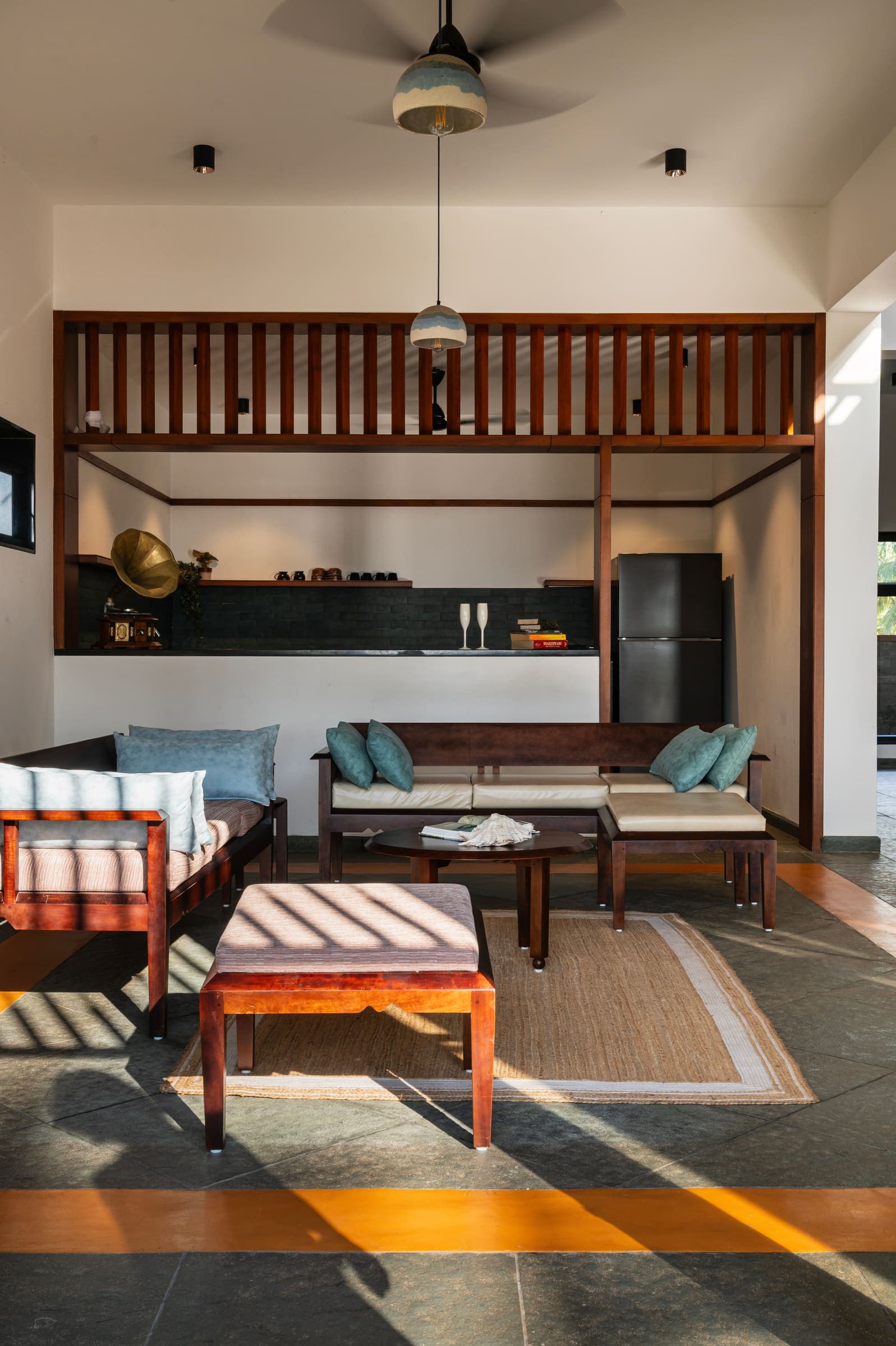 The living room under its high ceiling