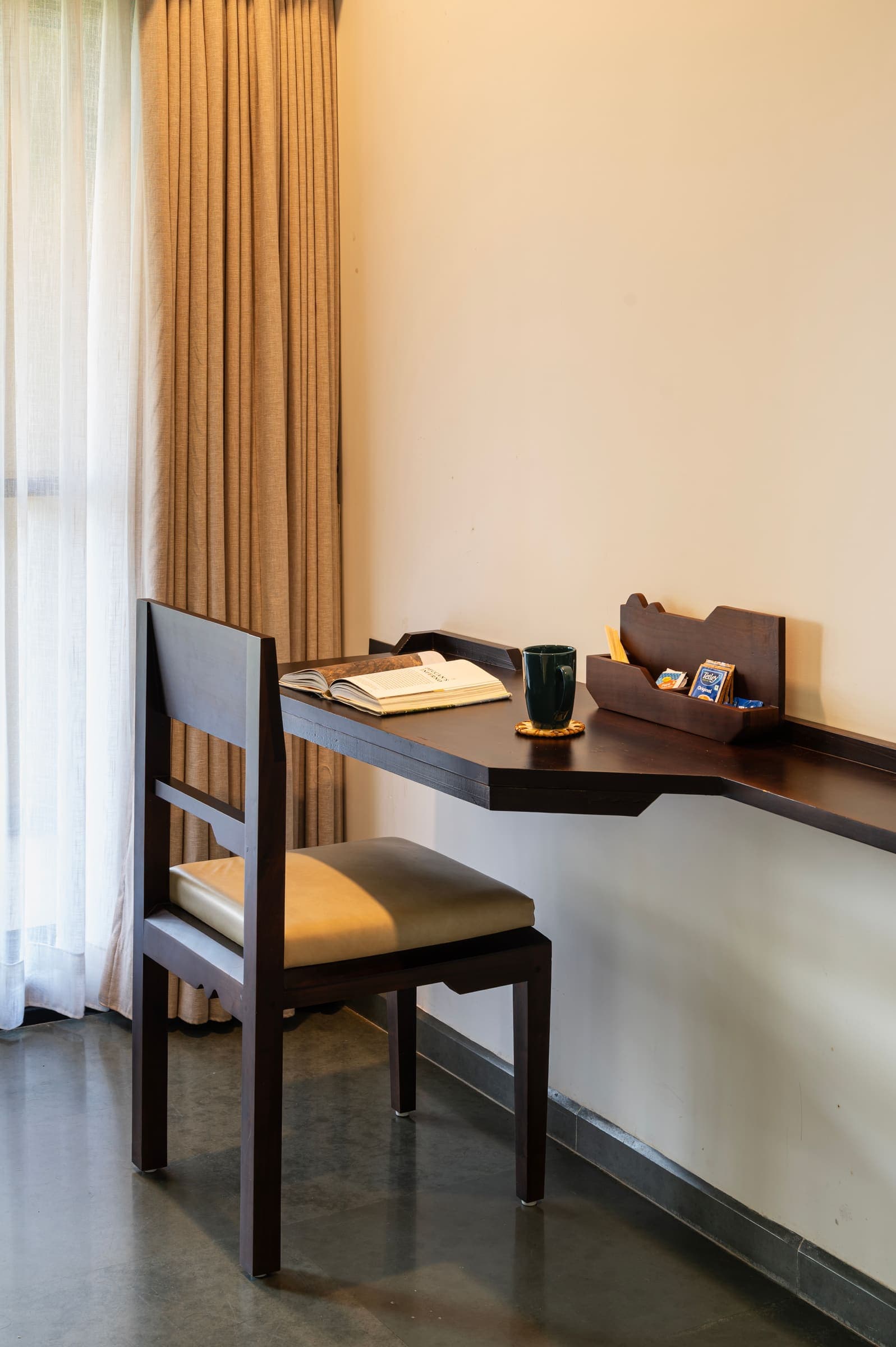 The in-room desk and chair by the window