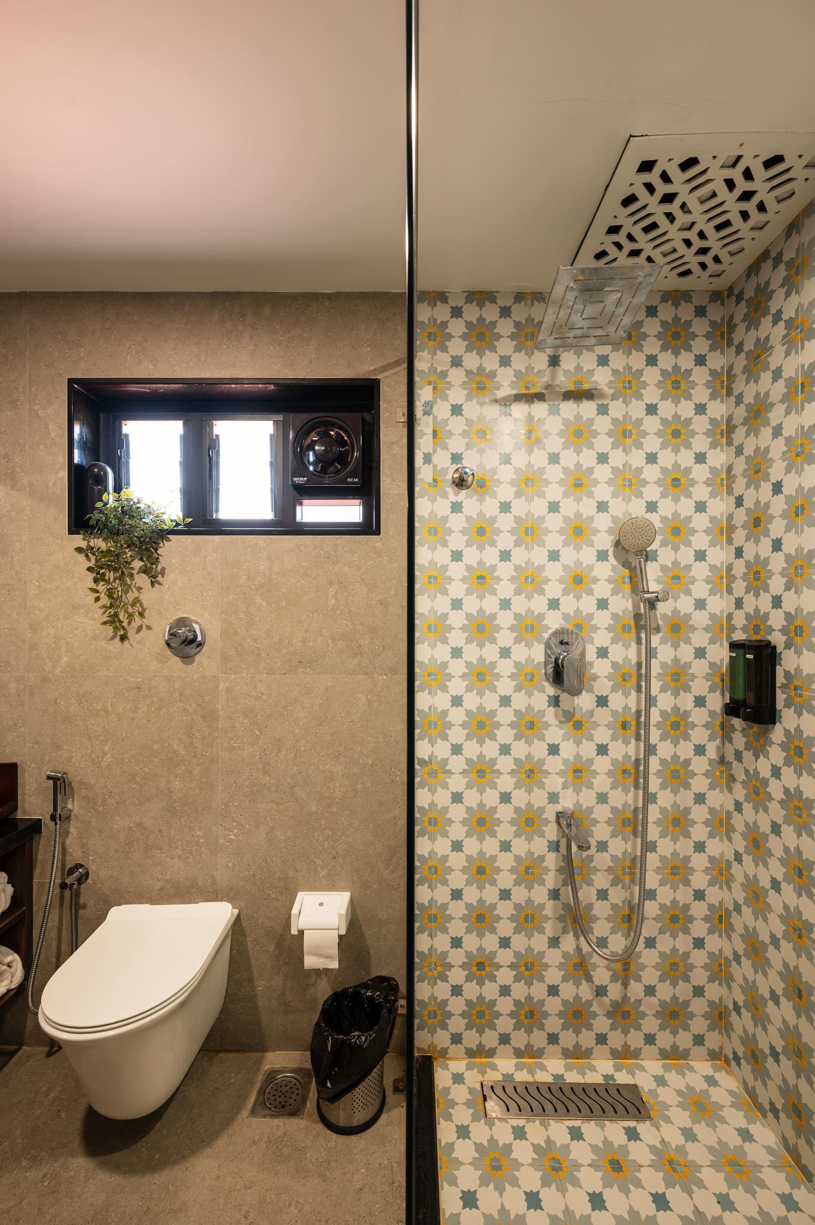 The Varahi bathroom with hand-patterned shower tiles